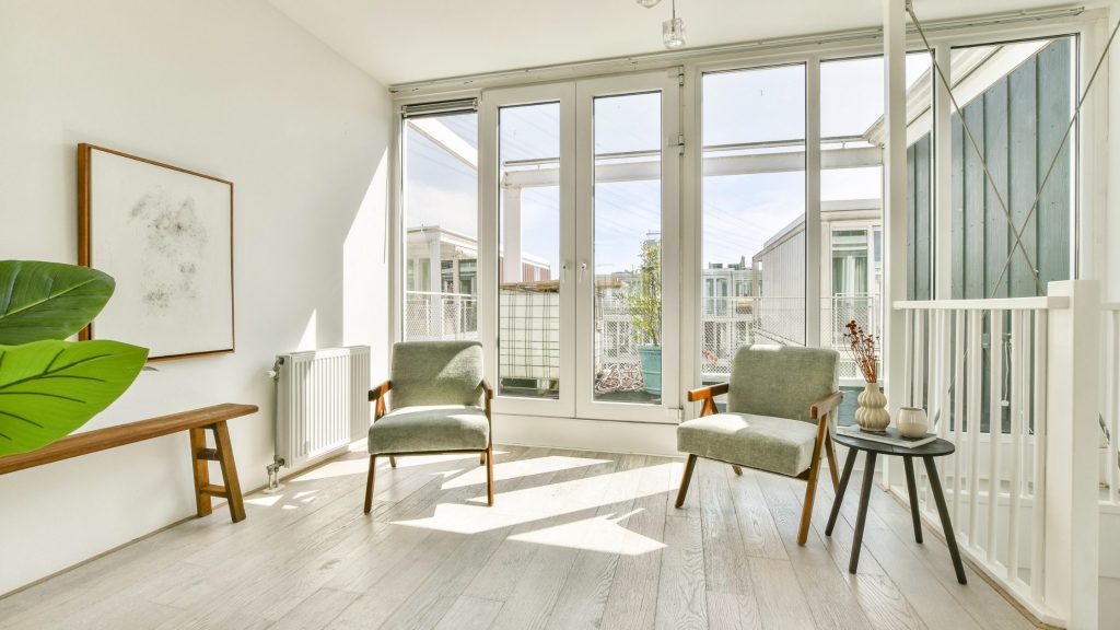 Floor-to-ceiling windows maximizing natural light and panoramic views.