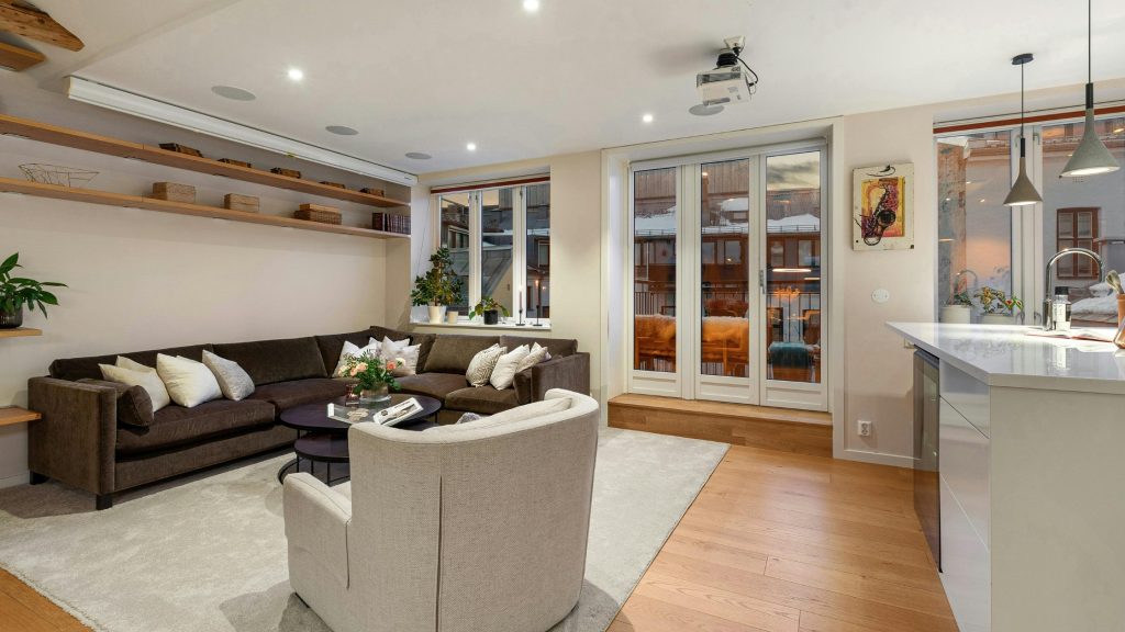 Windows enhancing openness and seamless indoor-outdoor flow.