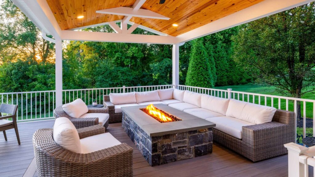 Fire pit on deck creating cozy gathering space Fire Pits & Outdoor Fireplaces