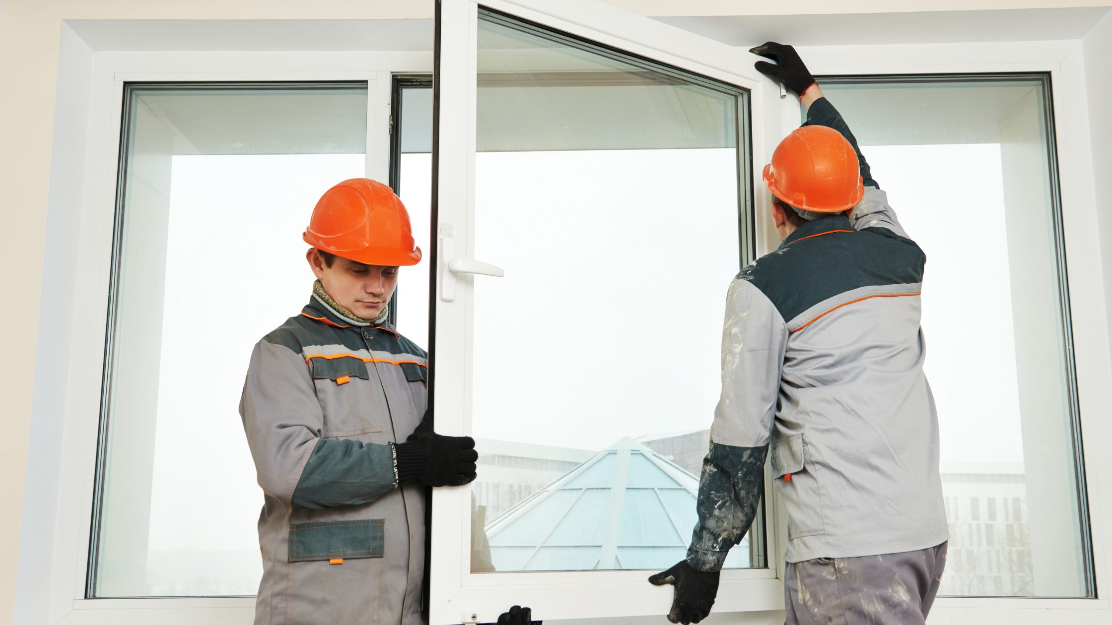 Placing insulated glass into the frame.